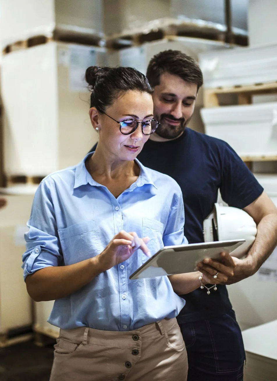 Colleagues holding a device